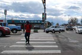 A pedestrian curb extension is an expanded area at intersection corners to provide a larger pedestrian area and shorter crossing distance.