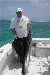 repair for the Penn Tackle company will give Chuck caught a 89 lb. Sailfish and released it. a power point presentation on the care of reels and the repair facilities of Penn Tackle.