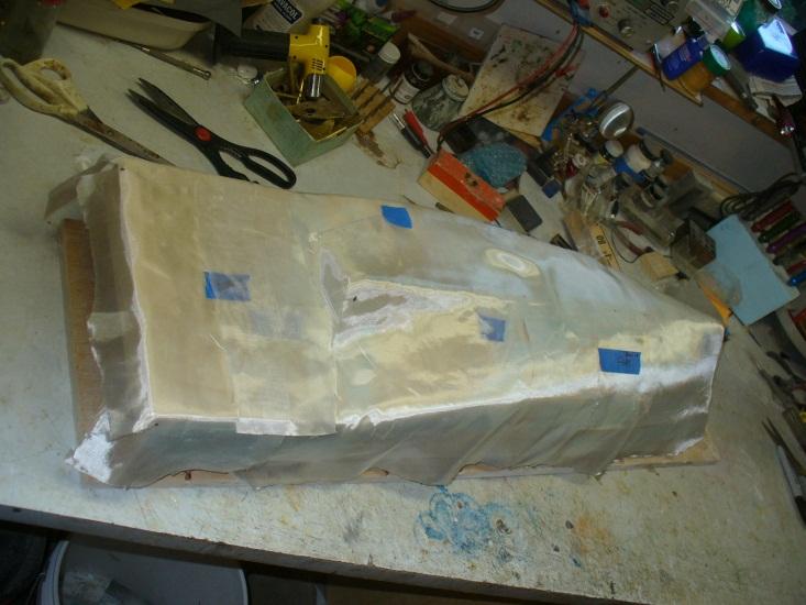 Next, I glassed the hull exterior using polyester resin and 1.