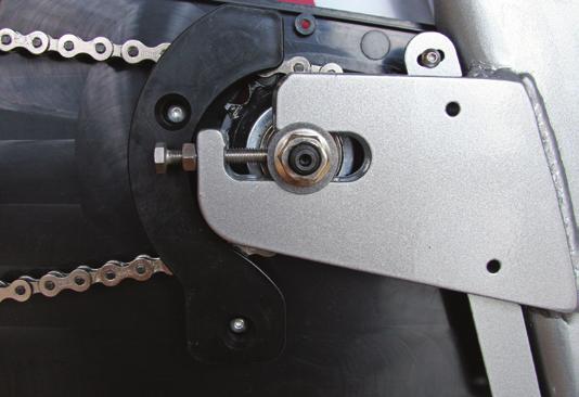 for consultation prior to adjusting the tension of the chain. 2 STEP 1: To access the axle nut on the right side of the Spinner EDGE you will need to first remove the front chain guard cover.
