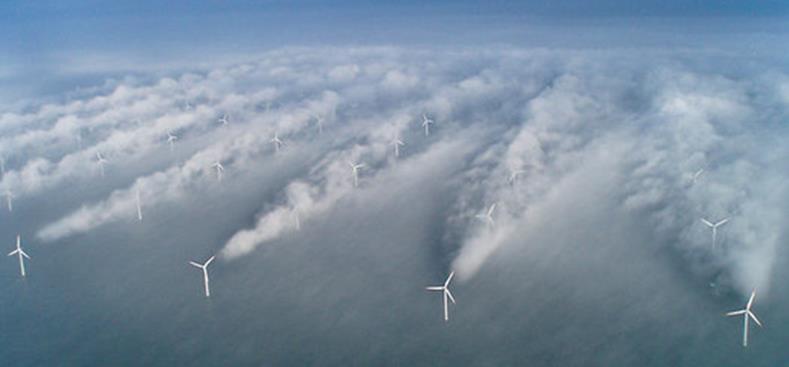 Wake effect Clouds form in the wake of the front row of wind turbines at the Horns Rev offshore wind farm in the North Sea Back-row wind turbines