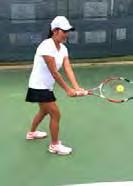 Step 1: The Back Swing: When Marimel is forced deep into the backhand side and realizes that she has to hit a defensive lob, she pivots to the left and gets her racket back early.