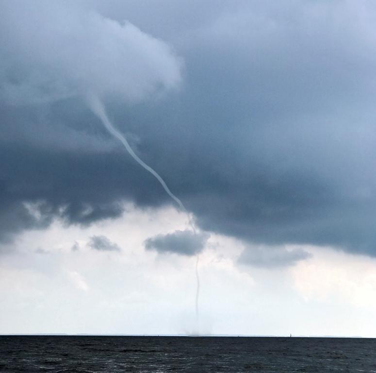 v=r4hhuyeihqk) taken from one of the fishing boats. You can see Endurance at the very beginning of the clip at the base of the waterspout scooting off to the left out of harm s way.