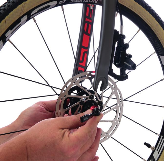Step 2 of 5 Securing front wheel 1. Put front wheel into the fork. Ensure quick release (QR) lever is not on gear side. Check this matches rear Hubs - Your hubs are fi tted with sealed bearings.