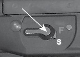 The safety is on when the safety lever is in the S (SAFE) position and the trigger guard is closed.