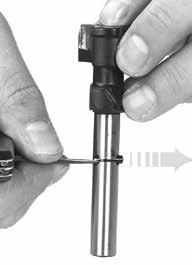 15. Remove the firing pin: a. Depress the firing pin by pressing the rear of the bolt head against a flat surface until flush and hold; b.
