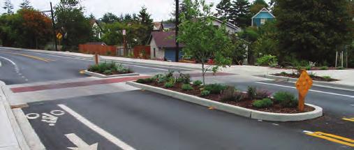 Raised Crosswalks Accessibility: All corner features, such as curb ramps, landings, call buttons, signs, symbols, markings, and