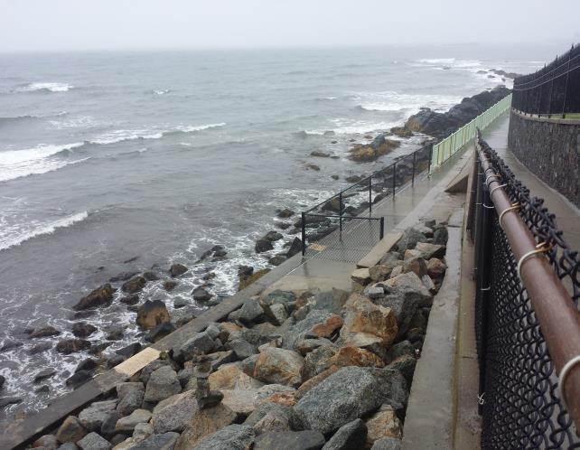 This fence reduces the number of visitors and walkers from walking on the rocky area below, while still allowing surfers and fisherman access to the popular surf and fishing location.