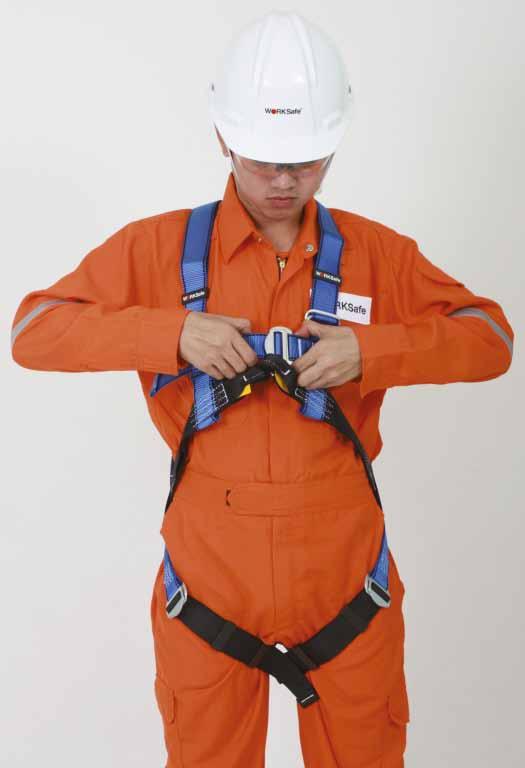 Steps to donning a WORKSafe harness 1 2 3 Hold the harness by the back D-ring.
