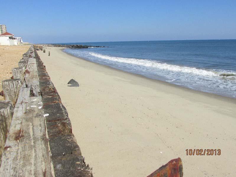 The loss of over 12 cubic yards per foot of bluff sediment to the beach zone apparently has resulted in a dry beach by Oct. 2, 2013. Figure 21.