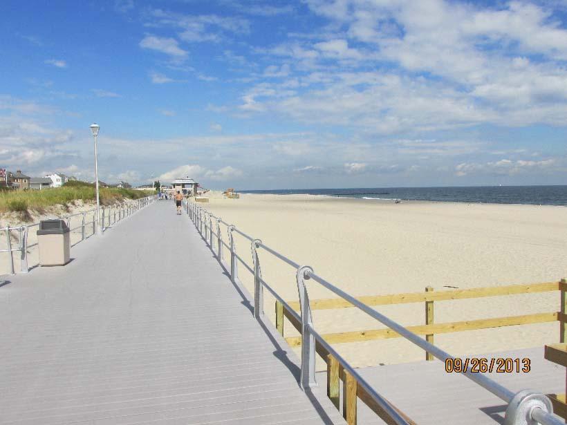 A massive effort restored the boardwalk by Sept 26, 2013 and 31.40 yds 3 /ft. in eroded beach/dune sand returned to the beach naturally. Figure 32.