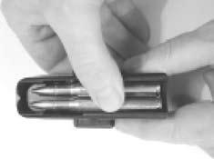 LOADING/INSERTING THE MAGAZINE Loading Place cartridge on top of the magazine and push in by thumb pressure.