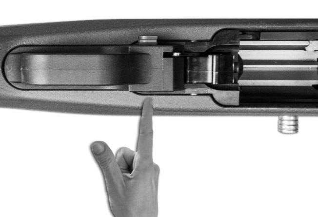 INSPECTING YOUR RIFLE CONTINUED Push the sliding safety button into FIGURE 8 the SAFE position (where no red line is visible on the safety button) (see FIGURES 9 and 10).