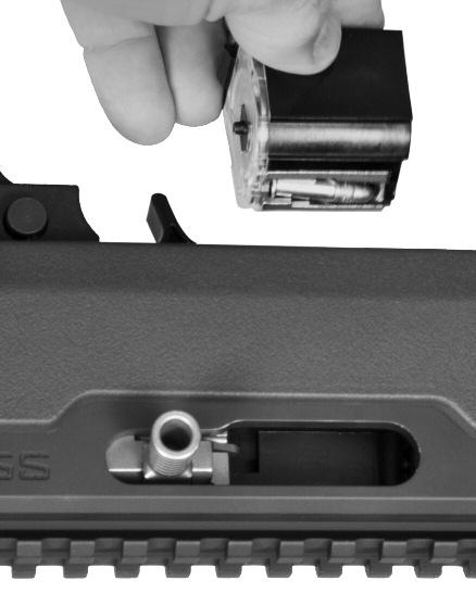 This will lock the bolt in the open position (FIGURE 17). Set safety button to the SAFE position (FIGURE 18).