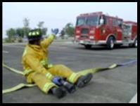 Shoulder loading can be performed with the hose on the ground or from the bed with one or multiple firefighters.