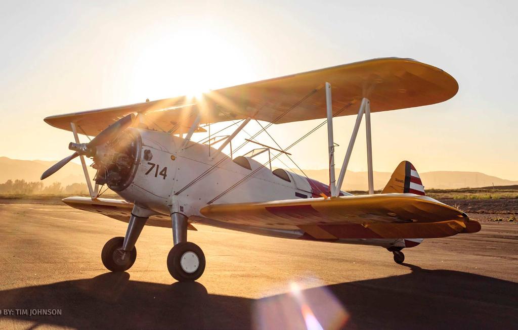 Calendar of Events Photo by: Tim Johnson Michael Fetyko s Stearman during golden hour at the PVMAC field.