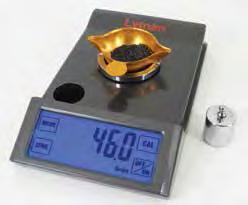 It comes with a removable powder trickler that can be mounted on the scale in a right or left-hand position.
