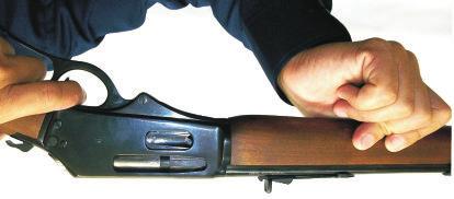 safety to the fire position ( RED side exposed) then pull the trigger to fire the firearm.