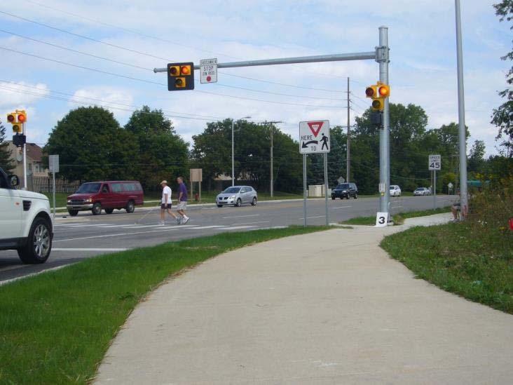31 Multilane crossings Need pedestrian activated signal or equivalent, per proposed PROWAG 2011