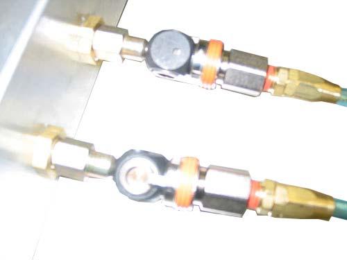 h. Connect the two coiled pneumatic hoses to the output side of the control