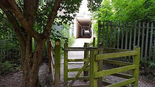 barrier would have a big impact on Orbital accessibility and would be high priority. 24. Wooden kissing gate at Colchester mainline station tunnel (Charter Wood) Ref: 51.90145, 0.