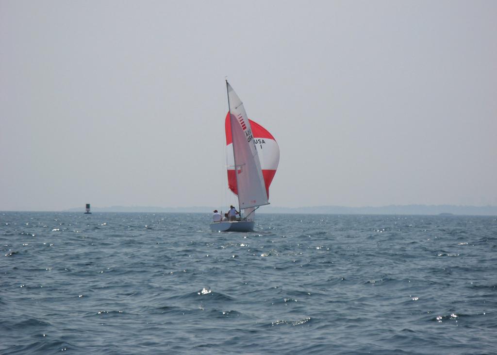 Vang tension is critical down wind. Initially we set the vang tension for reaching around the starting line so that we have leech tension when we are trying to accelerate off the starting line.
