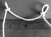 This knot is used to tie two ends of string together. To tie the knot, position the two ends of string alongside one another facing in opposite directions.