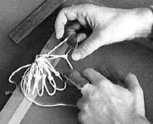 With the loop held in place by your thumb, as shown, pass the shuttle up through the loop formed by the previous row and tie your Sheet Bend, pull the knot tight.