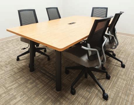 Tables with modesty panels adapt to changing needs by managing power and data cables with an