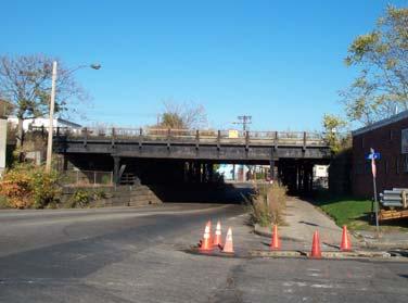 4.11 Washington Street Existing Conditions: The New Hampshire Main Line crosses over Washington Street via a 6-track railroad bridge.