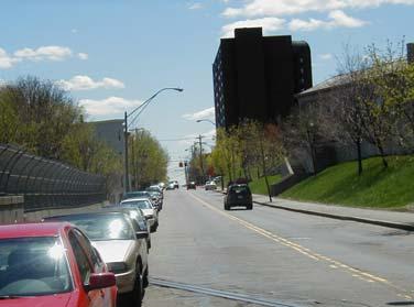 4.3 Medford Street Existing Conditions: Medford Street crosses over the New Hampshire Main Line at a skewed alignment via a concrete beam structure that was constructed in 1910 and later rebuilt in