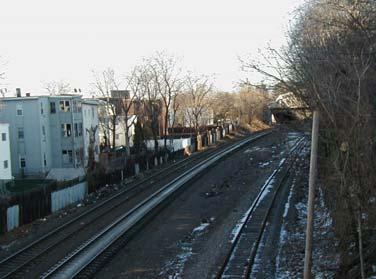 There is not enough space to construct a path between the freight line and the crib wall. Opportunities: The slope adjacent to the tracks varies in width from 30 to 52.