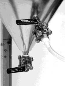 Racking finished beer gravity drain: Connect a clear sanitized hose and hose barb to the racking arm valve as shown in Fig. 27.