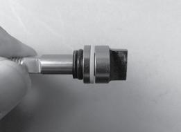 Lubricate the o-ring (34) and install it onto the valve plug (33).