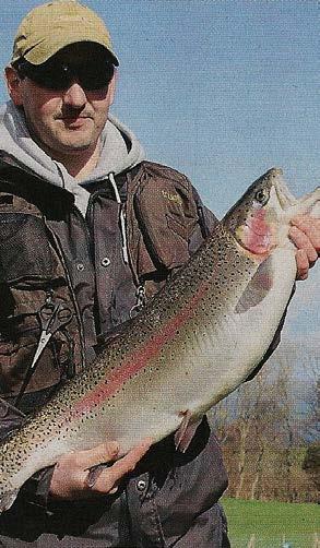 Dai Davies took a 15lb rainbow in the Øresund James Green holds a 12lb-plus rainbow from the trout farm These barges are not just for growing fish - the architect who planned the scheme had practical
