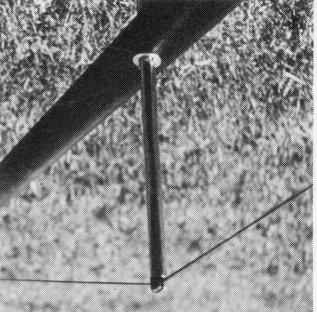 To assemble the diamonds on the lower mast section, first untwist the wires, then insert the spreader tube, slip a washer on each side and push the cotter pins