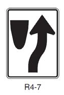 It is very important to properly sign raised divisional islands. Commonly used signs include: Divided Highway (W6-1) or Keep Right (R4-7).