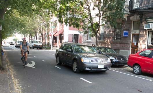 In general, a dashed bike lane indicates that cars may enter