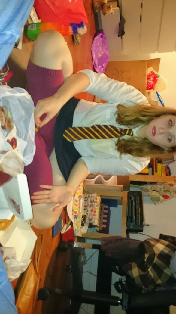 cottage whilst dressed as a Hogwarts school girl.