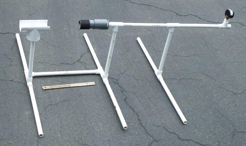 8. Cut two 40 cm lengths of ½-inch PVC pipe. Insert these lengths into the side openings of a ½- inch PVC tee.