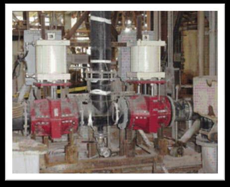 Shown here are 8-inch air-actuated pinch valves handling lime slurry in a power plant application. Pinch valves also address abrasion concerns. In abrasive flows, you have two options.