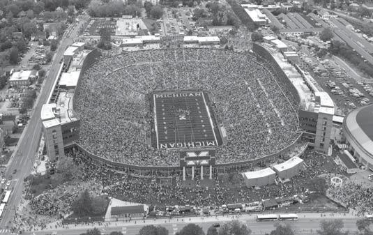 The box seats and railing are removed from the first few rows and replaced with bleachers. 1974 / Michigan leads the nation in attendance, as it has done every season since except 1997.