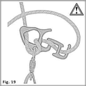 Twist the bight up to create a loop so the brake end of the rope is on top and in front of the other rope (Fig. 22).
