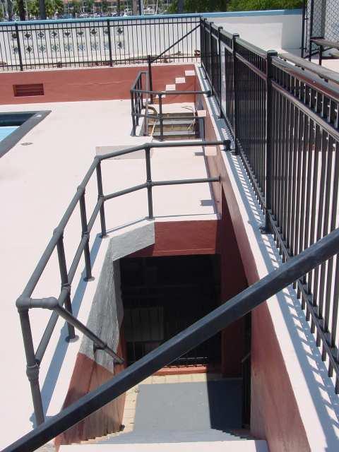 Interior stair from entry area to pool deck