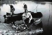 The May family enjoyed fishing, swimming, and water-skiing on the creek in the fifties.