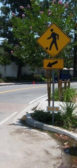 11) The 2014 California MUTCD permits the use of two primary roadside pedestrian crossing signs: Yield Here to Pedestrians (far left photo) and the