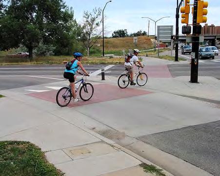 vehicles and crossing path users, it is essential to use geometric design to create a slow speed turning movement.