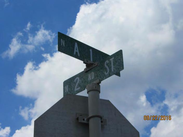 Location: Corridor-Wide Issue #4: Signage Figure 2 Figure 3 Description of Issue: The street signs along the corridor to the north of SR 00 were beginning to fade and crack, had a varying letter