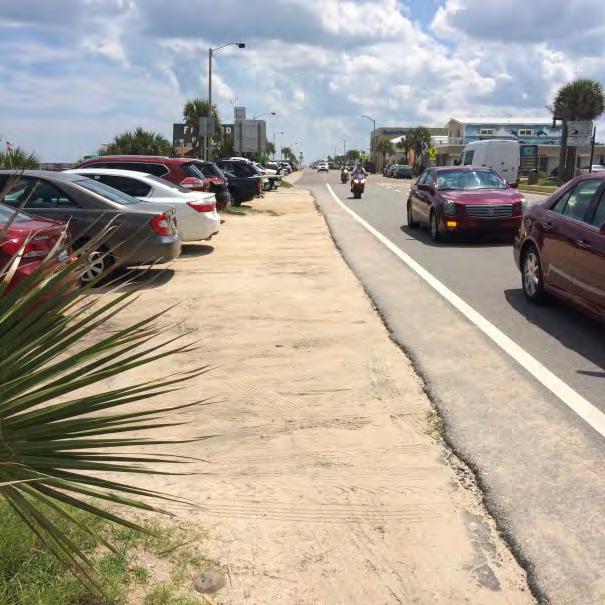Along the east side of SR AA, drop offs were observed between the sand parking areas and the shoulder (see Figure 6 and Figure 7).