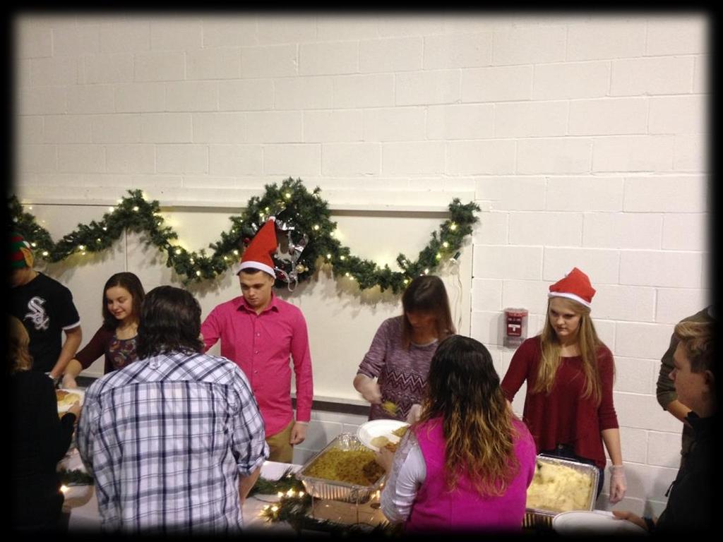 Salvation Army Angel Tree. Members served dinner to the more than 200 people in attendance.
